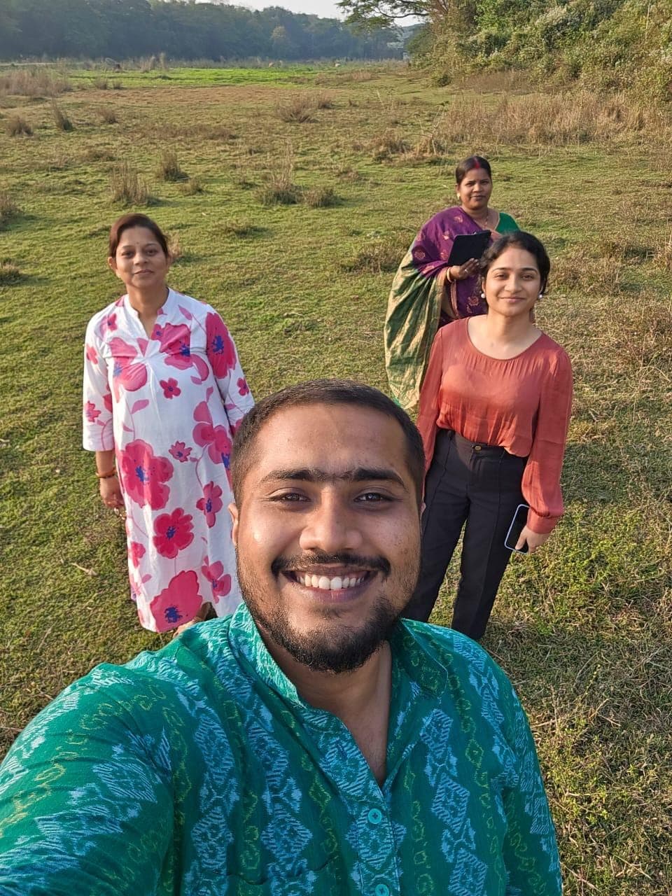 The myefarm team on a field visit with a producer group